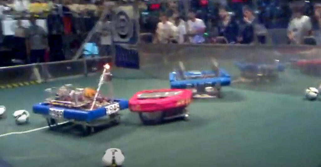Robot competing in robot soccer